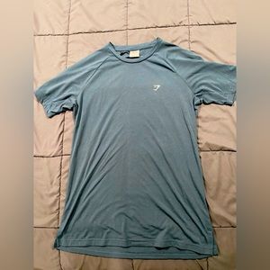 Gymshark athletic short sleeve t shirt. Size medium, color blue.